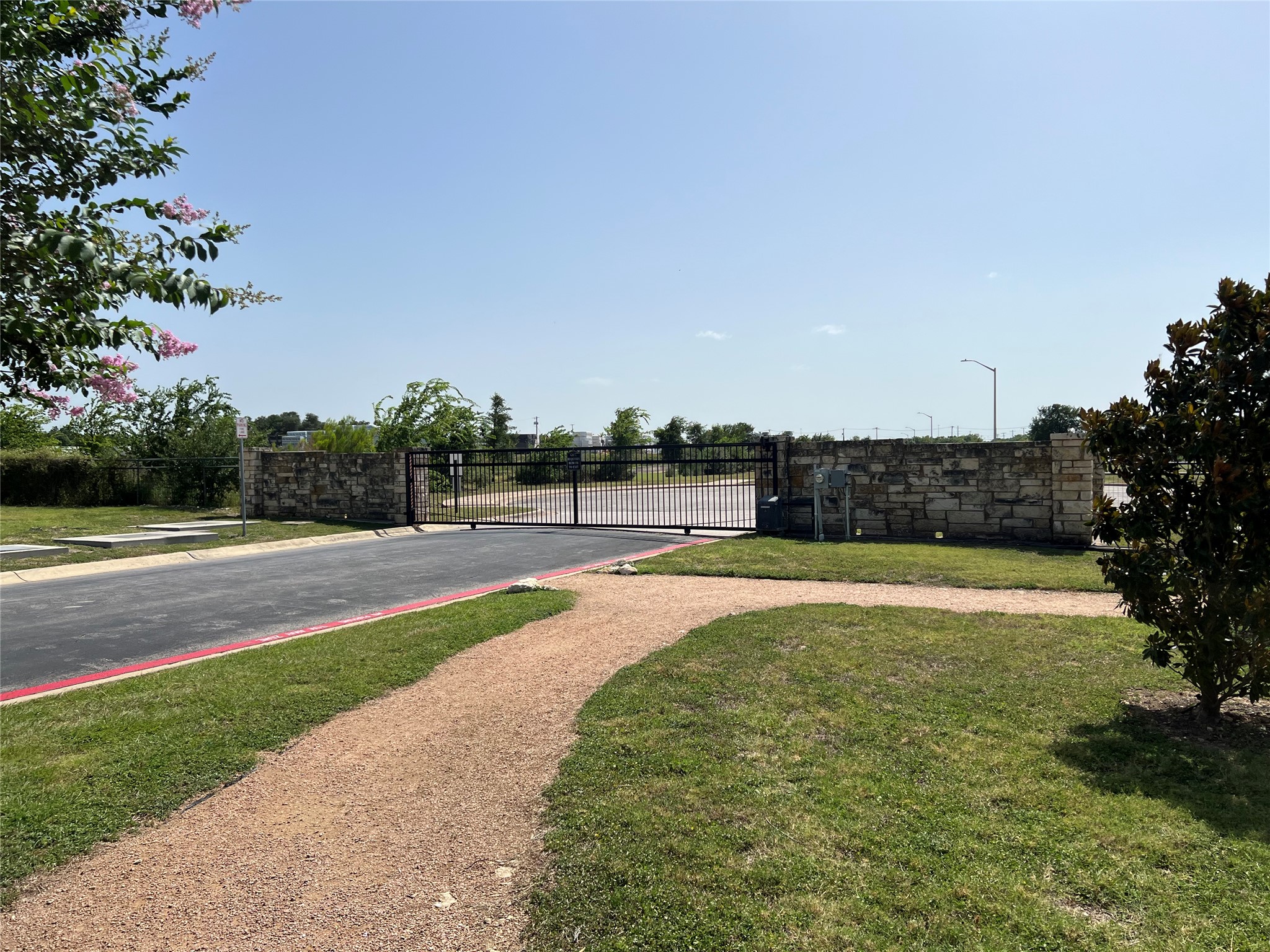 528 High Tech Drive Georgetown, TX 78626 - Photo 29 of 29 Gated entry and exit onto Austin Avenue for residents only.