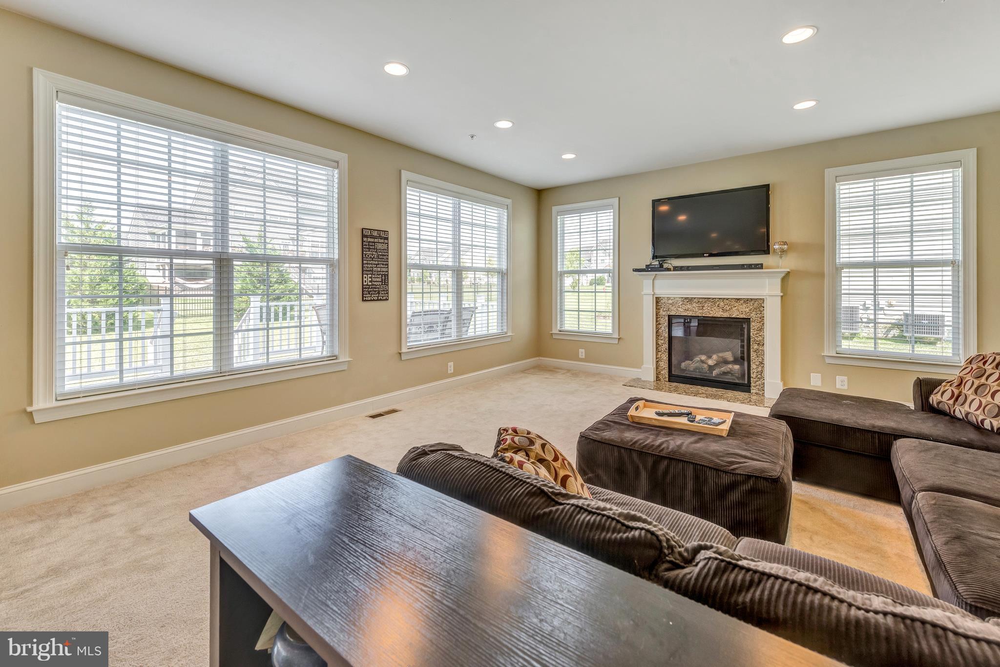 17912 Dr Walling Road Poolesville, MD 20837 - Photo 12 of 30 Bright and sunny family room. features a gas FP.