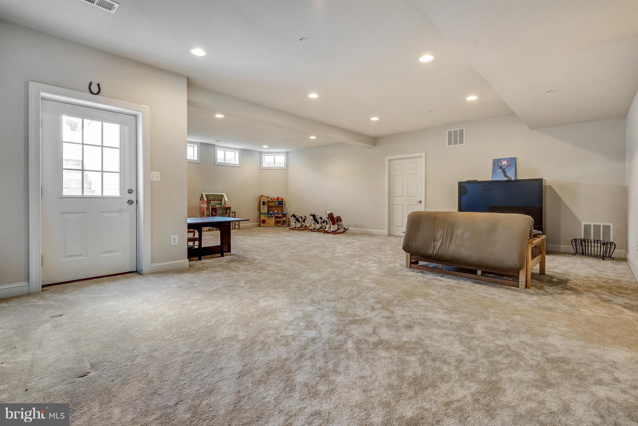 17912 Dr Walling Road Poolesville, MD 20837 - Photo 25 of 30 Fully finished basement has storage and walk-up