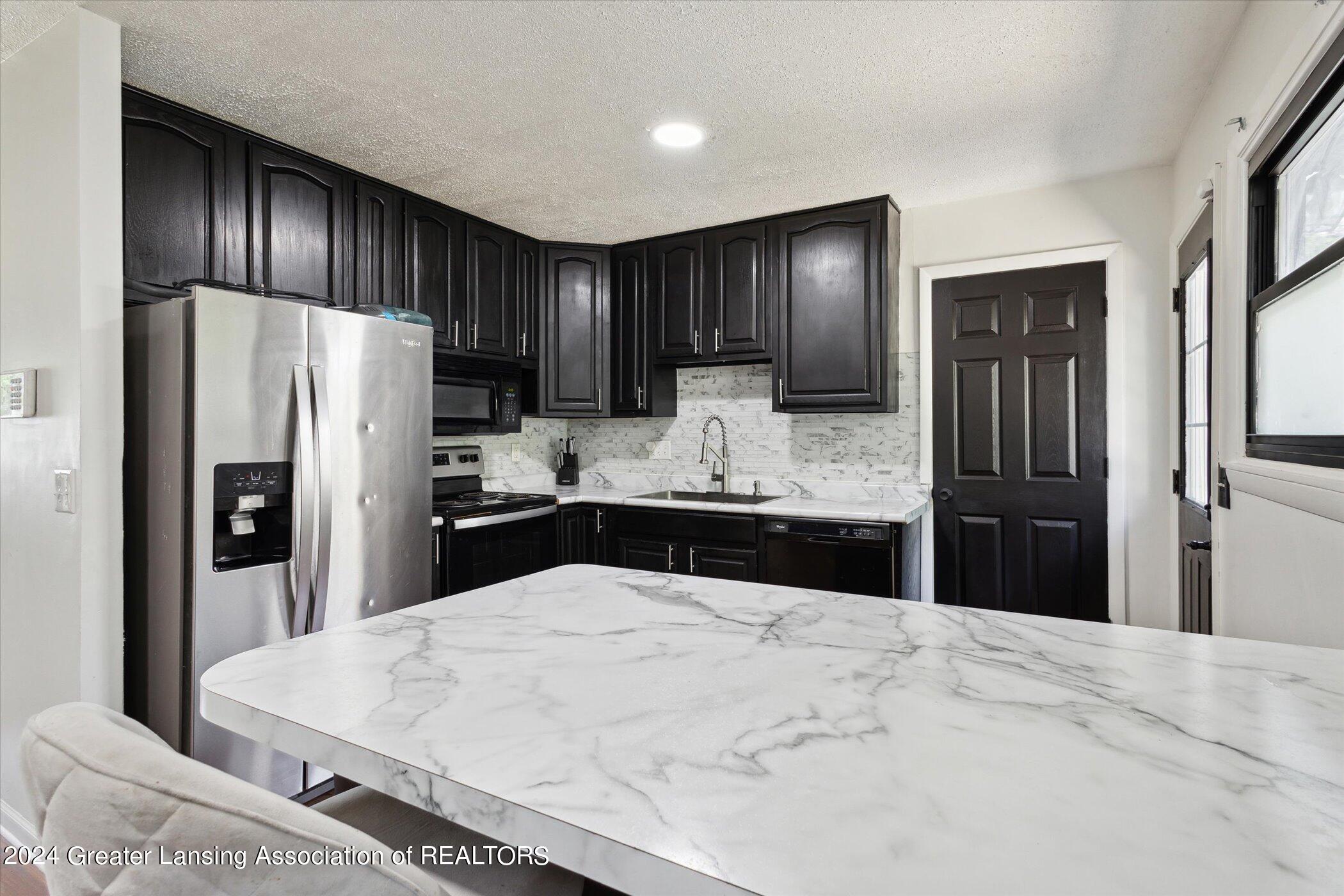 2129 Riverside Court Lansing, MI 48906 - Photo 9 of 29 13-2129-Riverside-Ct-Lansing-MI-48906-Wi
