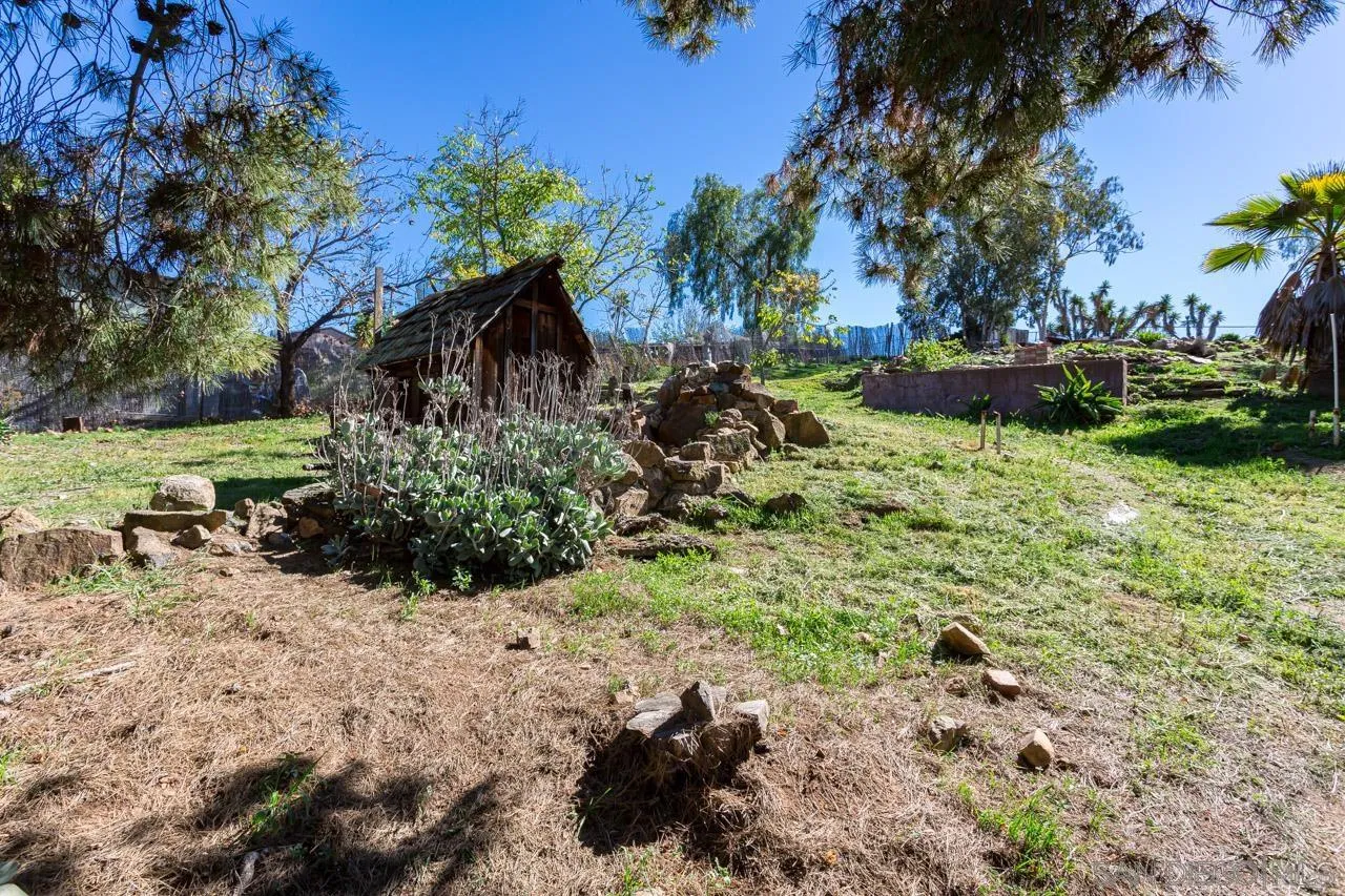 9111 Rosedale Drive Spring Valley, CA 91977 - Photo 23 of 32 a view of a garden with a building