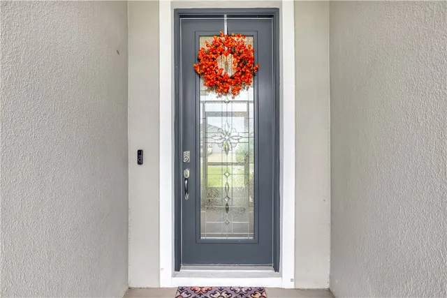 a view of a living room with windows
