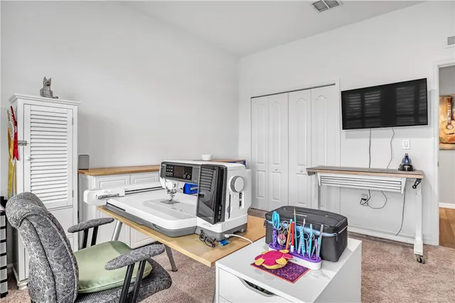 a bathroom with a granite countertop sink toilet a mirror a shower and a bathtub