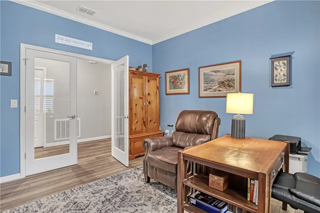 a kitchen with stainless steel appliances granite countertop a lot of counter top space and cabinets