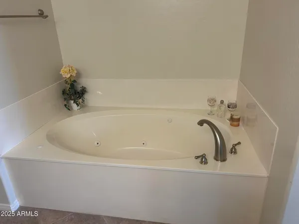 a kitchen with a sink cabinets and window
