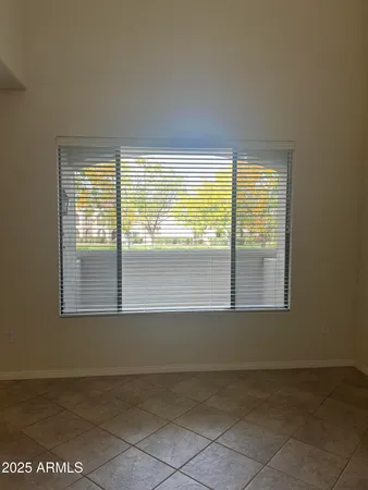 a stove top oven sitting inside of a kitchen