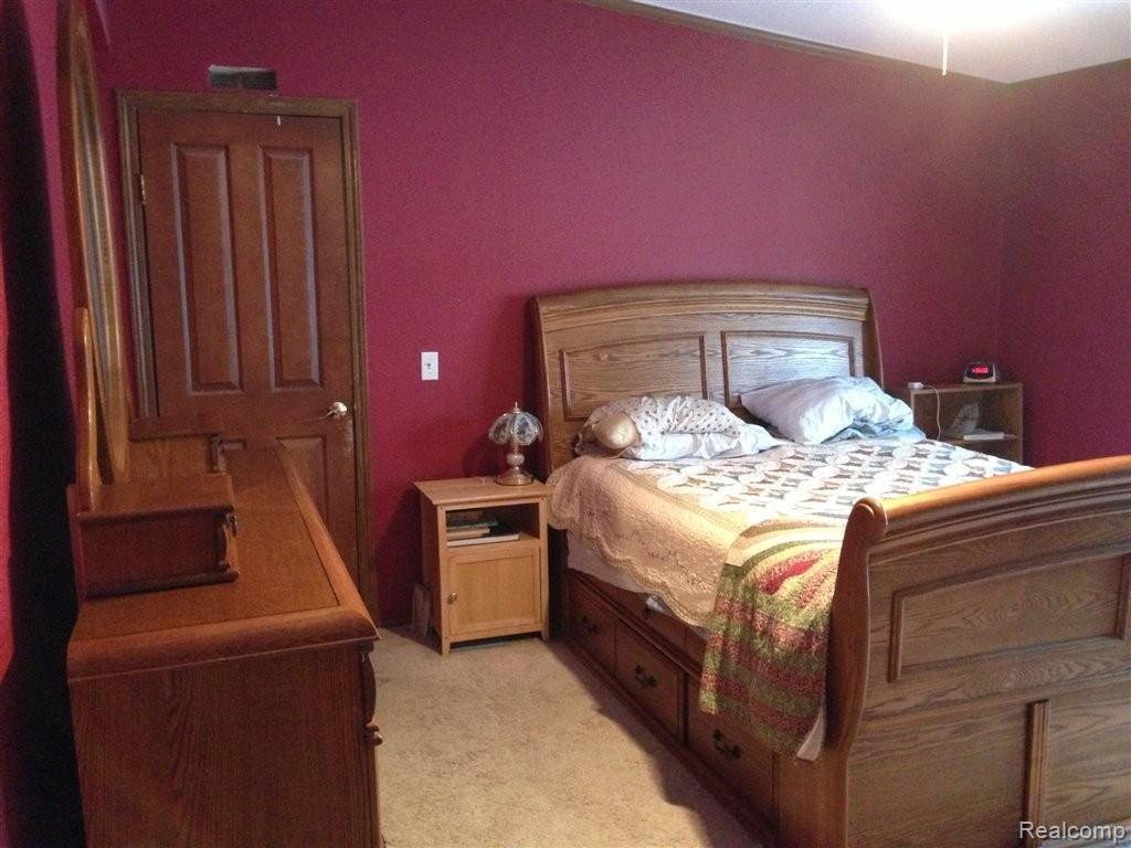 9166 Newburgh Road Livonia, MI 48150 - Photo 8 of 12 master bedroom