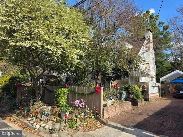 a utility room with a sink dryer and washer