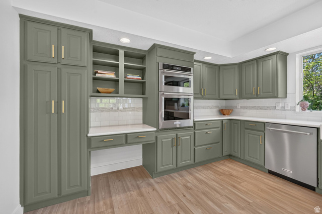1979 Cave Hollow Way Bountiful, UT 84010 - Photo 12 of 59 Kitchen featuring wood-finish flooring, recessed lighting, and sage green cabinetry with gold-tone hardware