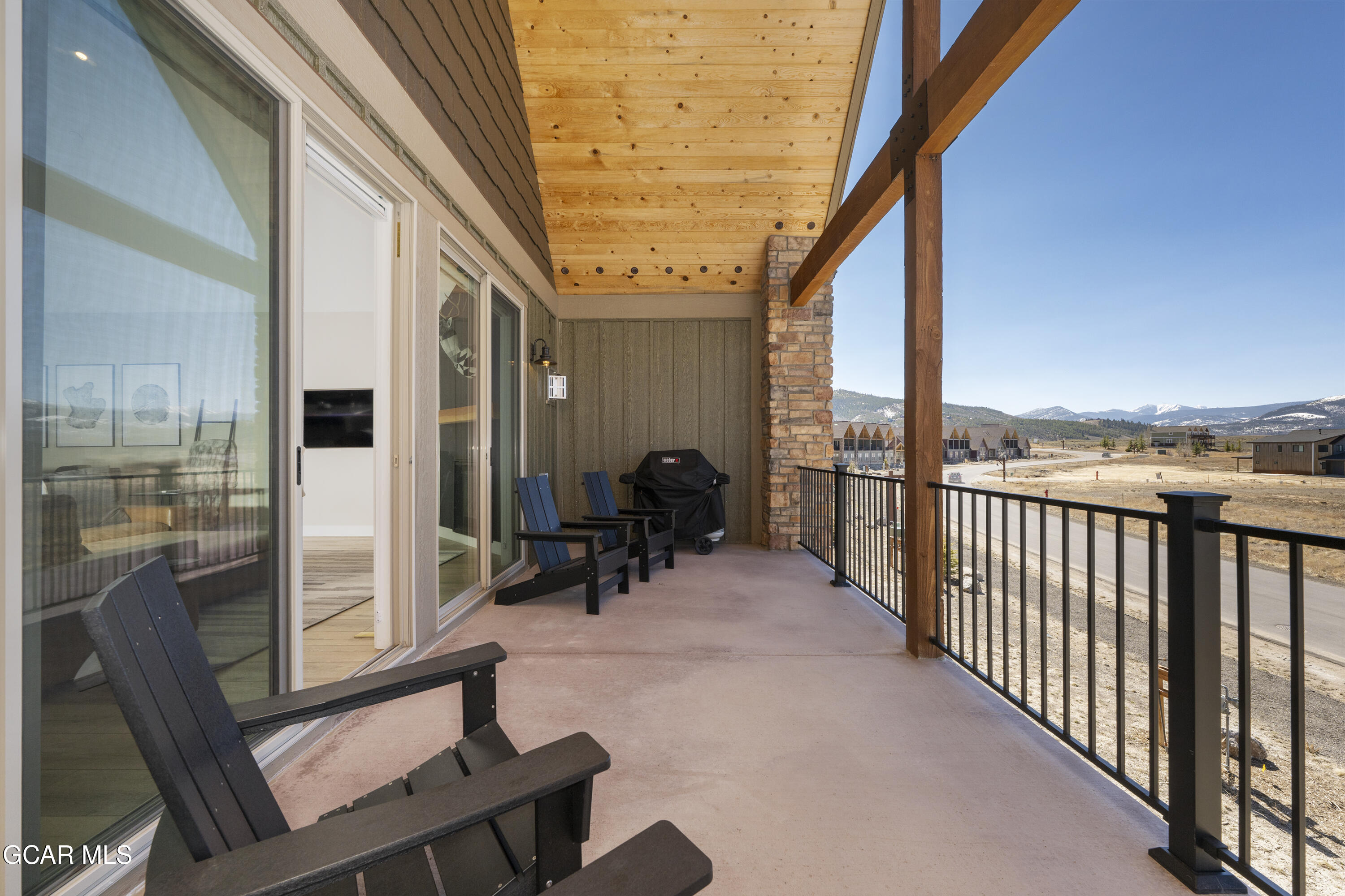 134 Eagle Ridge Drive Granby, CO 80446 - Photo 9 of 50 Huge Deck with Lounge Chairs and Grill