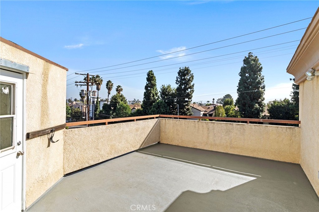 14957 Victory Boulevard, Unit 101 Van Nuys, CA 91411 - Photo 16 of 26 a view of balcony with outdoor space