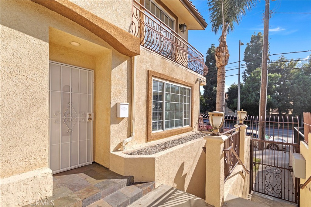 14957 Victory Boulevard, Unit 101 Van Nuys, CA 91411 - Photo 22 of 26 a view of balcony with couch and chairs