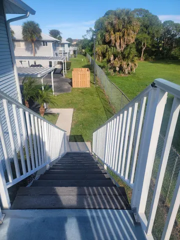 a view of a porch with garden