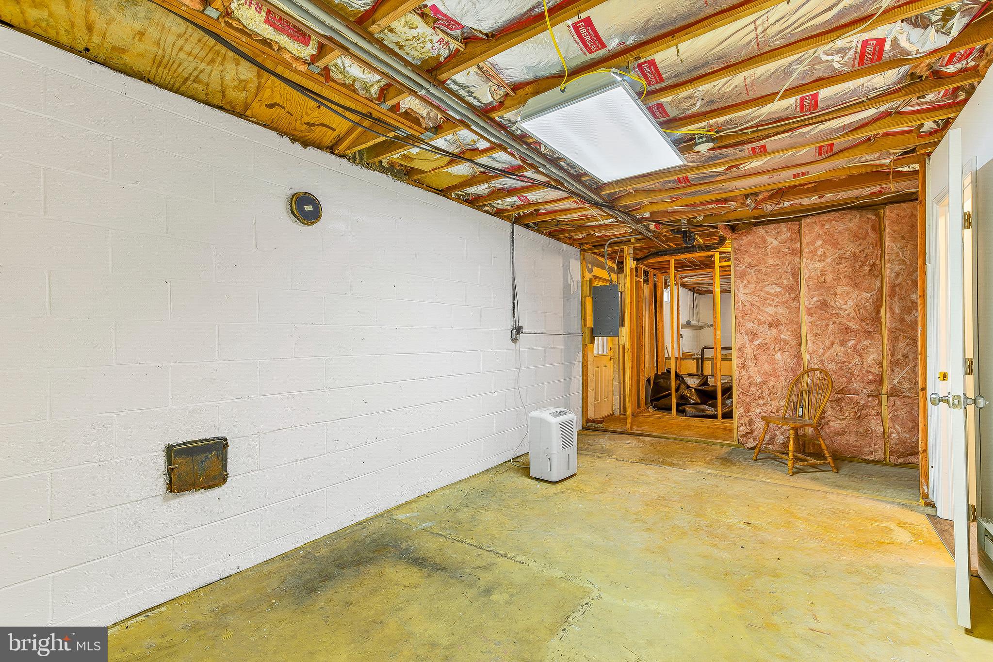 1400 Woods Road St. Leonard, MD 20685 - Photo 36 of 51 Unfinished basement w/ some framing.