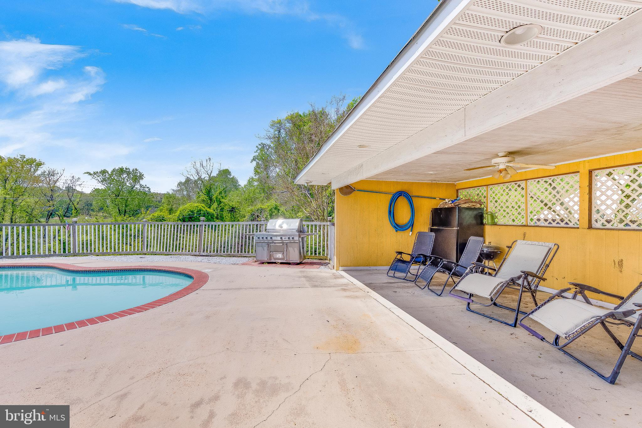 1400 Woods Road St. Leonard, MD 20685 - Photo 39 of 51 Large pool deck w/ covered patio area!