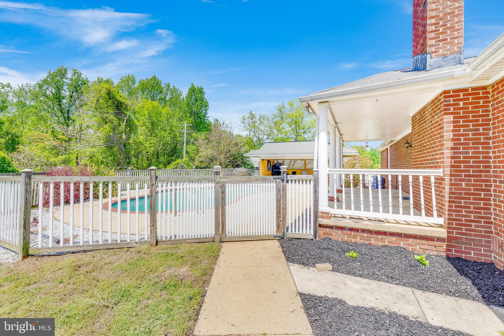 1400 Woods Road St. Leonard, MD 20685 - Photo 44 of 51 Pathway from driveway to pool/patio area.