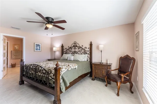 a bathroom with a shower sink and mirror