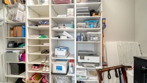 a room with a book shelf