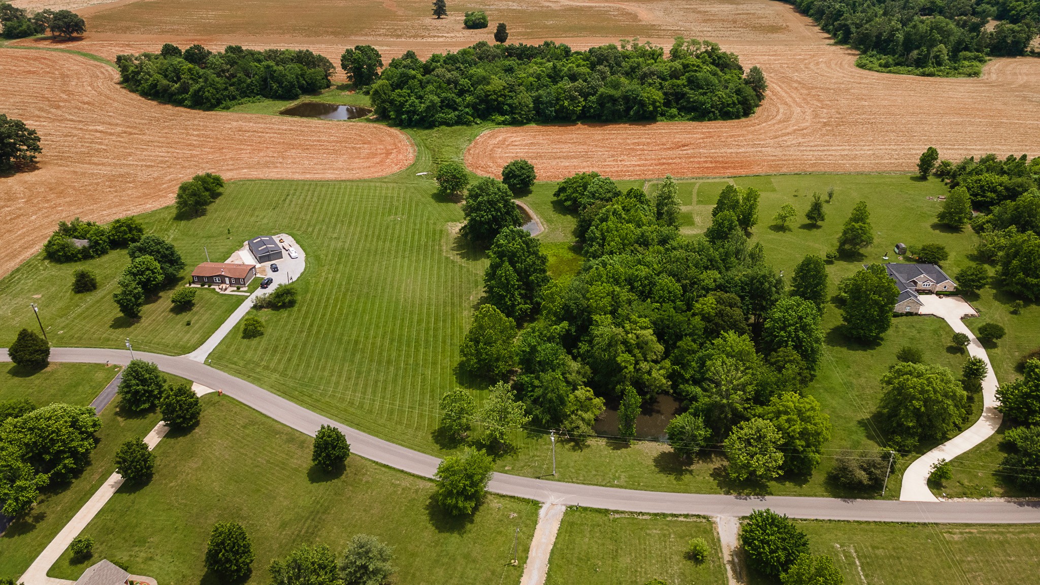 0 Williams Road Cross Plains, TN 37049 - Photo 1 of 8 an aerial view of a house having yard