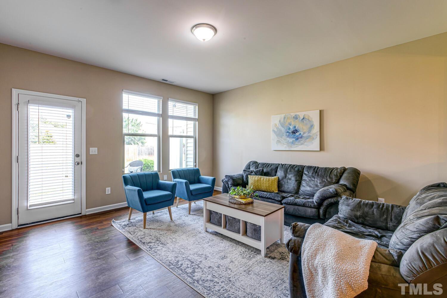 2416 Savior Street Raleigh, NC 27610 - Photo 16 of 47 a living room with furniture and a window