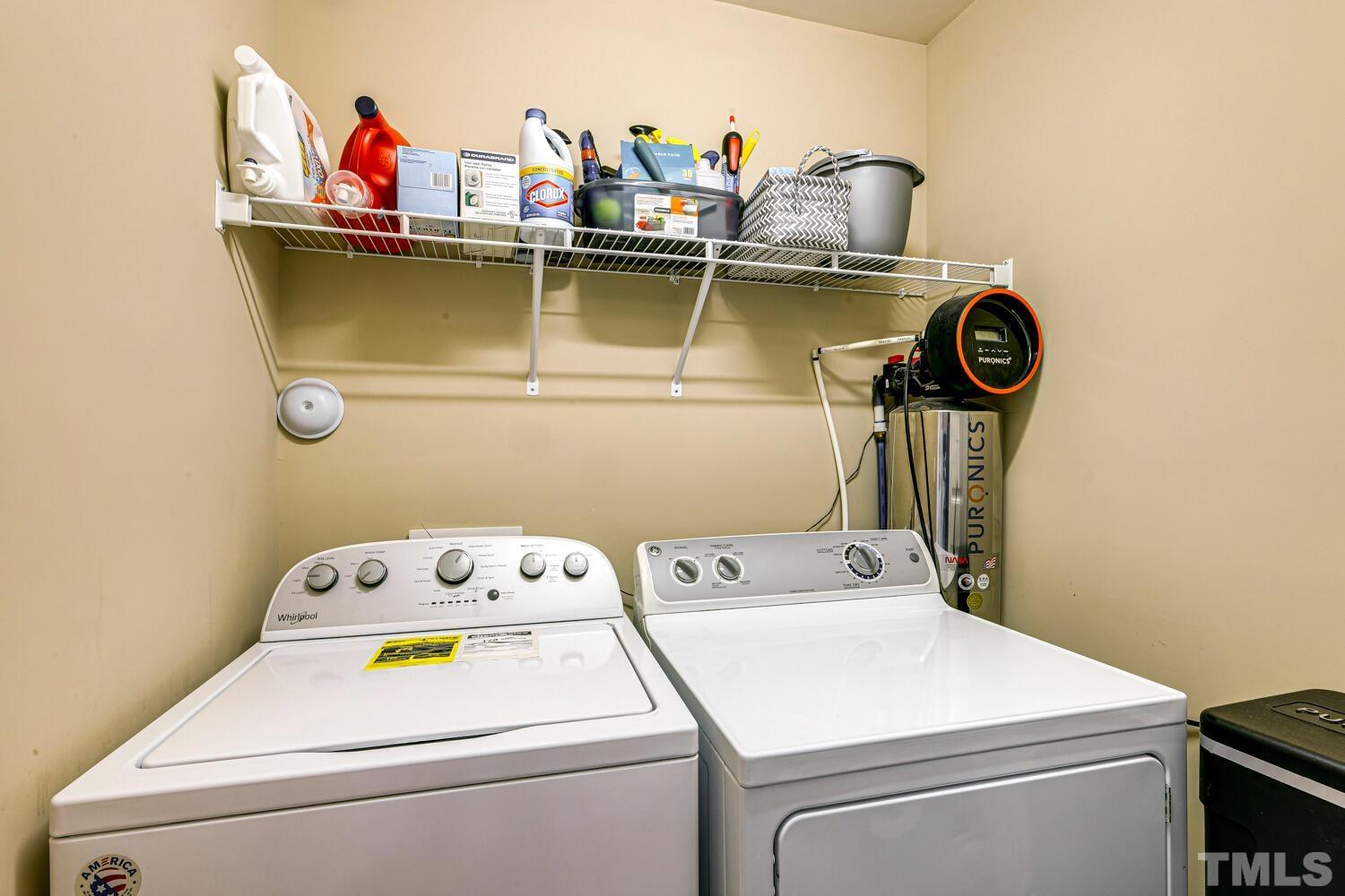 2416 Savior Street Raleigh, NC 27610 - Photo 29 of 47 a utility room with dryer and washer
