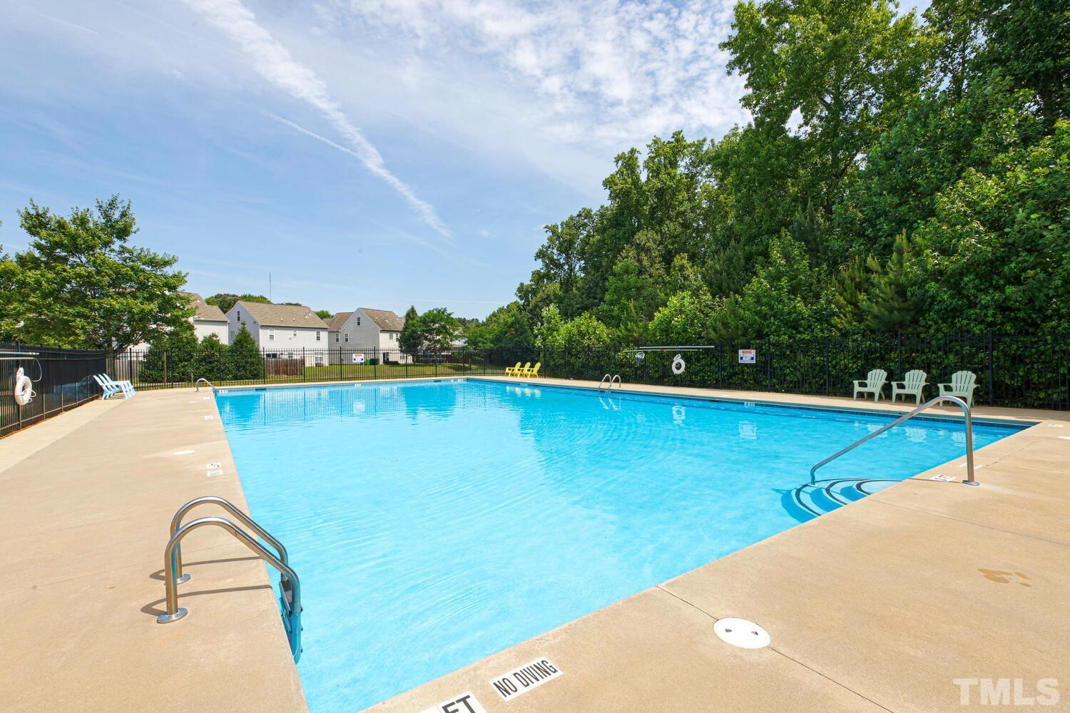 2416 Savior Street Raleigh, NC 27610 - Photo 46 of 47 a view of a swimming pool with a yard