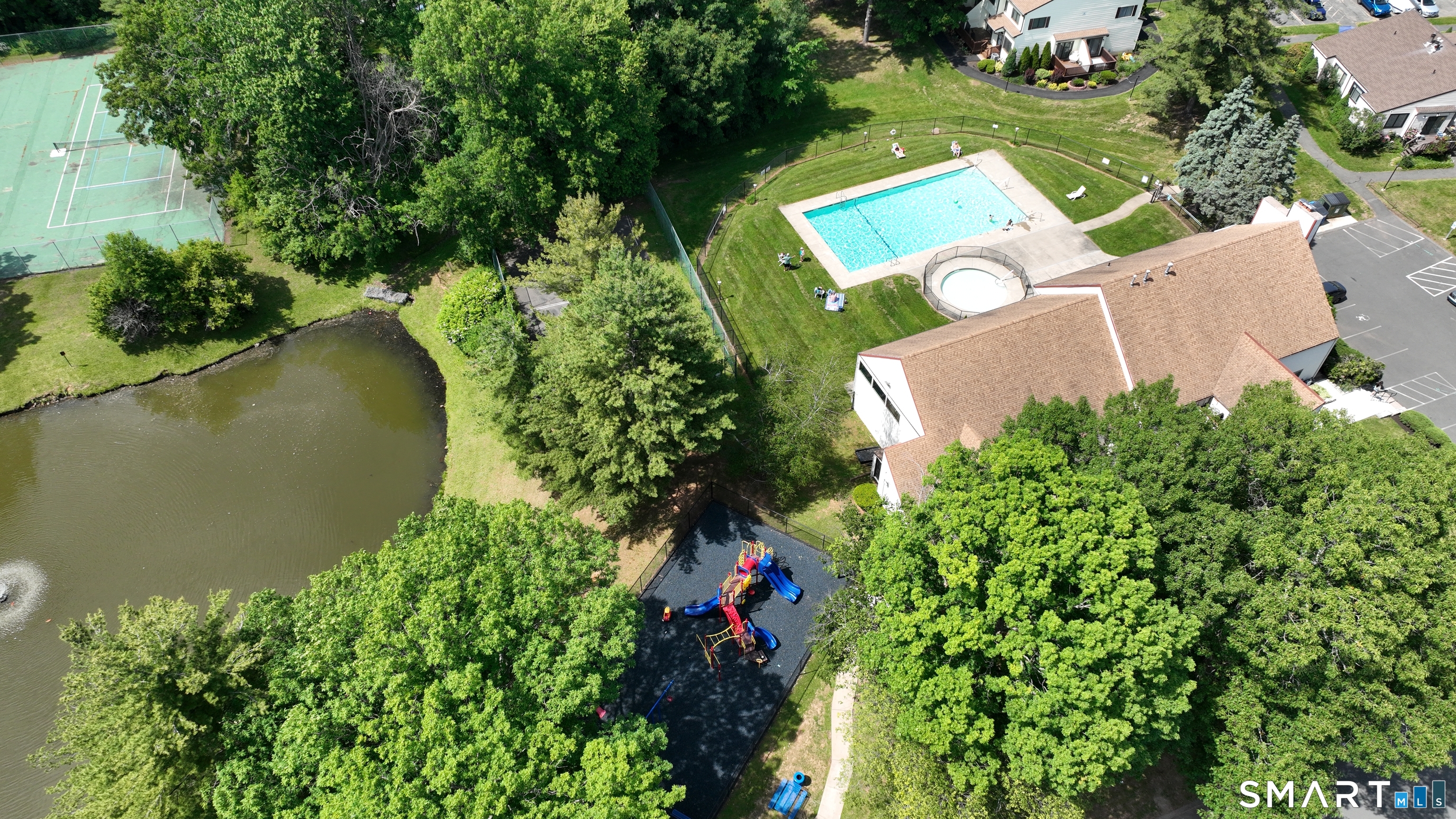 94 Cottonwood Road, Unit 94 Newington, CT 06111 - Photo 32 of 33 Community club house, pool, hot tub, tennis court, pond, playground for kids.