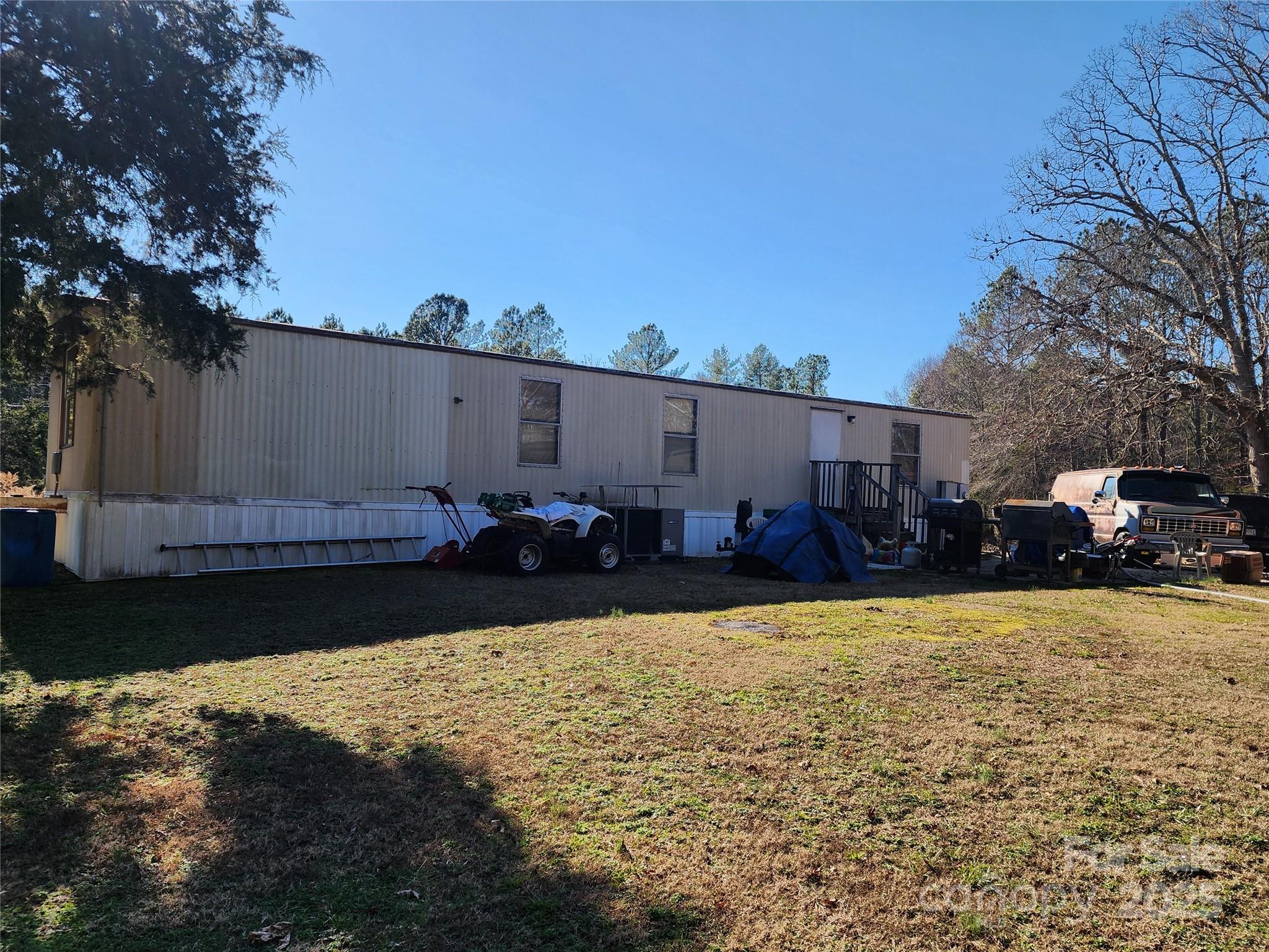 1342 McKnight Road Smyrna, SC 29743 - Photo 17 of 39 a view of a backyard of the house