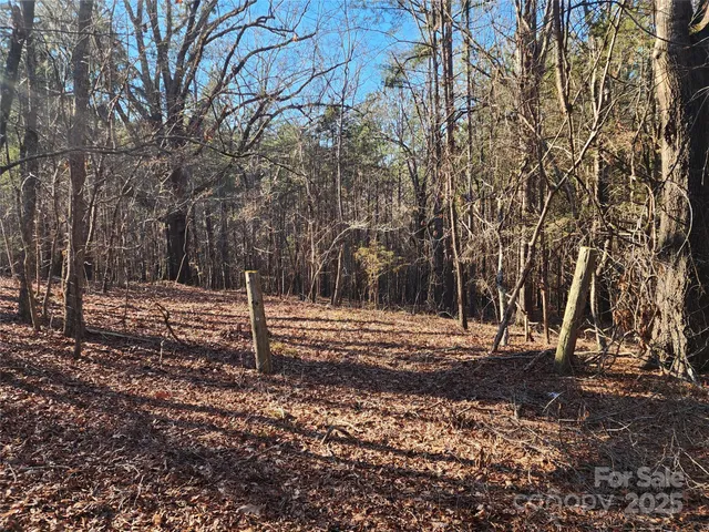an aerial view of a house with outdoor space