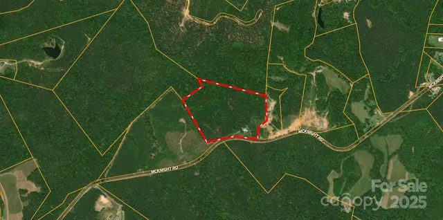 a backyard of a house with lots of green space and sink