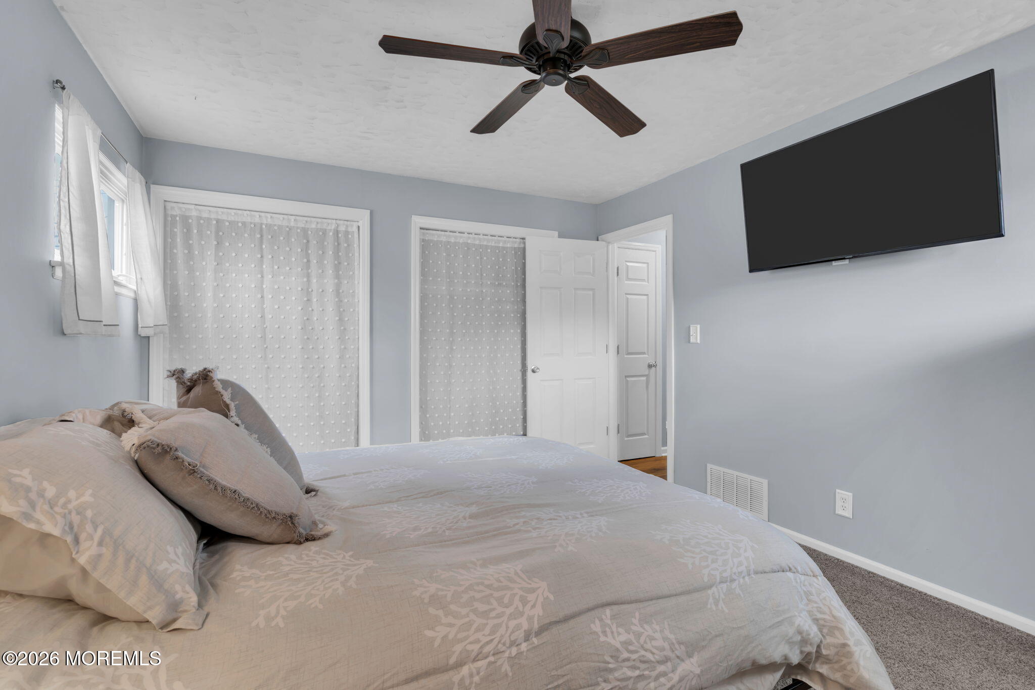 16 Hemlock Drive Parlin, NJ 08859 - Photo 14 of 22 a bedroom with a bed and a flat screen tv
