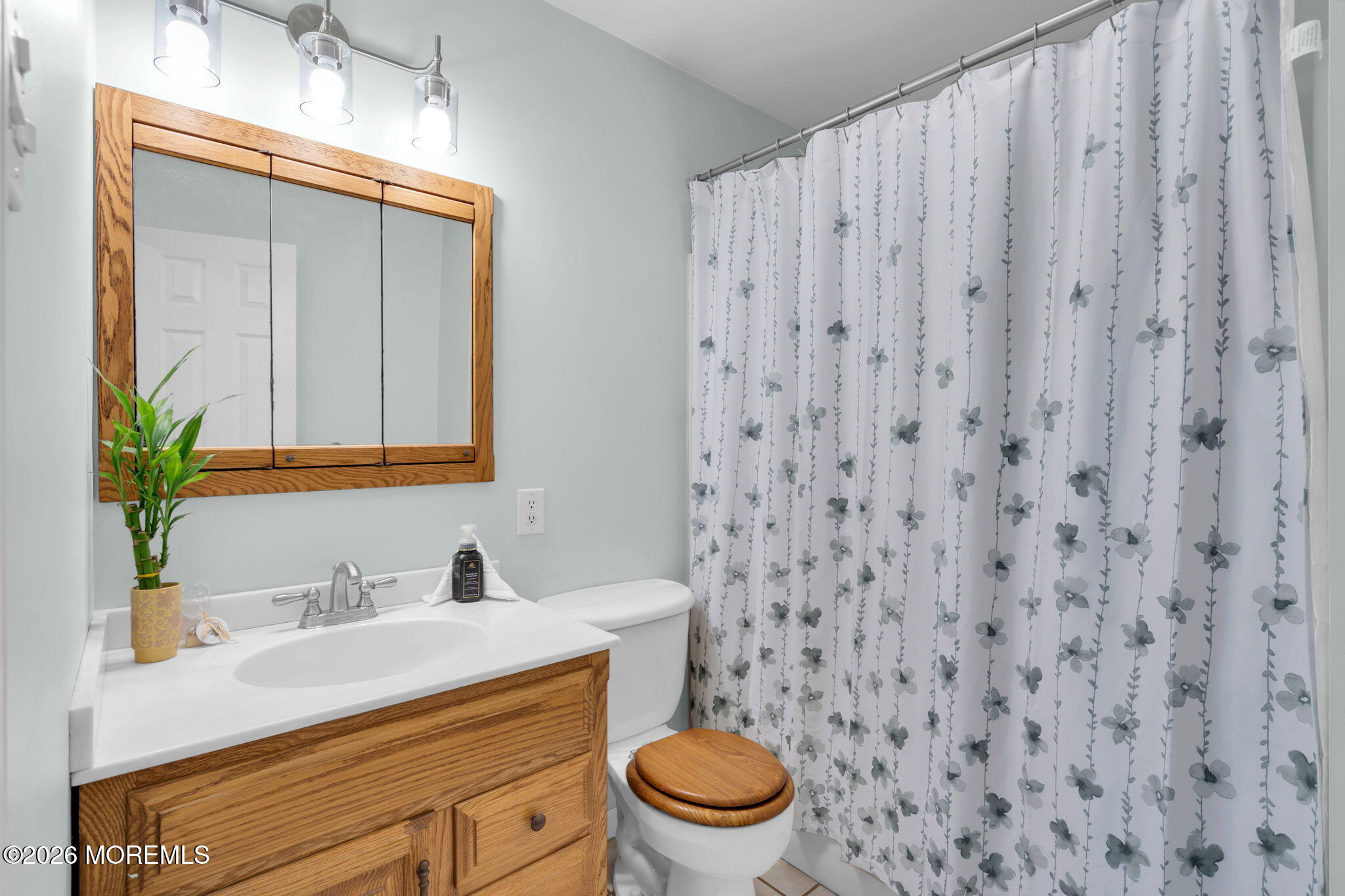 16 Hemlock Drive Parlin, NJ 08859 - Photo 17 of 22 a bathroom with a granite countertop sink and a toilet