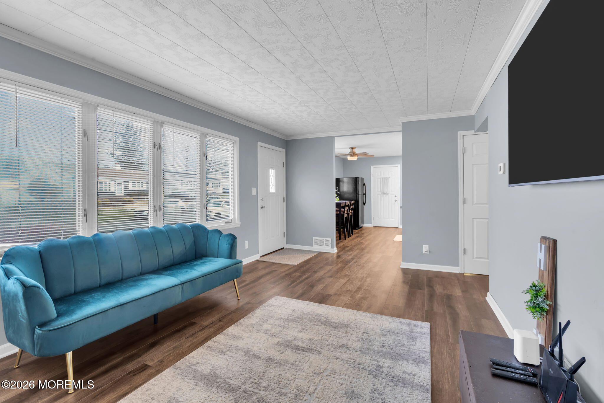 16 Hemlock Drive Parlin, NJ 08859 - Photo 5 of 22 a living room with furniture and a flat screen tv