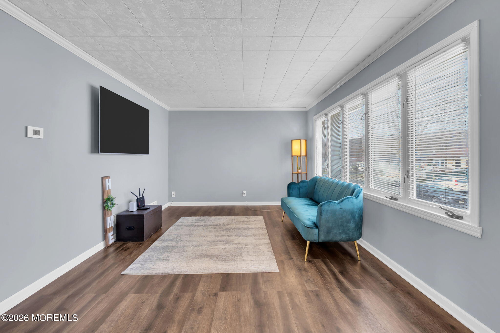 16 Hemlock Drive Parlin, NJ 08859 - Photo 6 of 22 a living room with furniture and a flat screen tv
