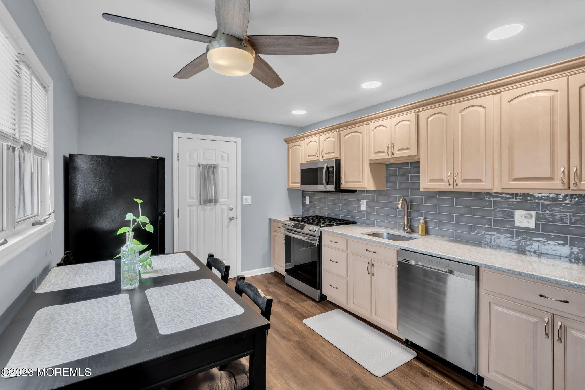 16 Hemlock Drive Parlin, NJ 08859 - Photo 10 of 22 a open kitchen with stainless steel appliances granite countertop a stove refrigerator sink and cabinets