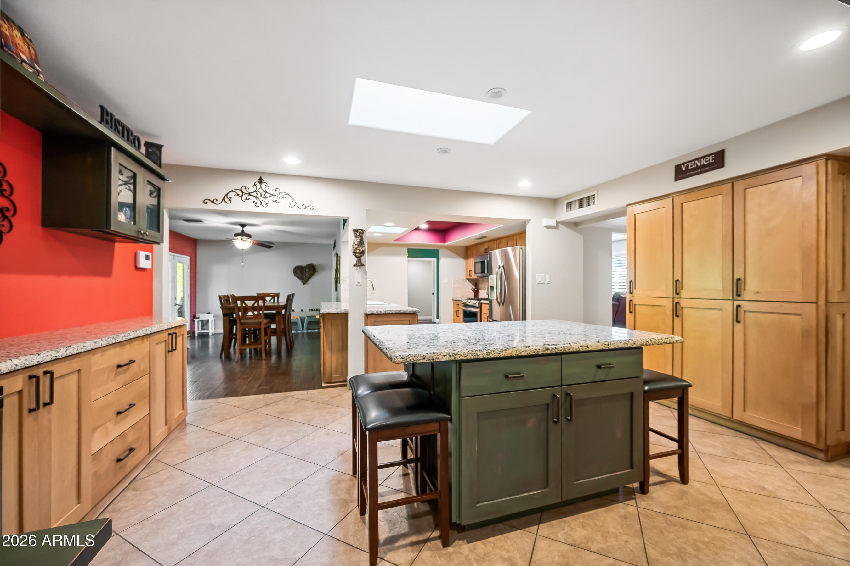 5802 South Stanley Place Tempe, AZ 85283 - Photo 17 of 50 a dining hall with stainless steel appliances granite countertop a sink and a refrigerator