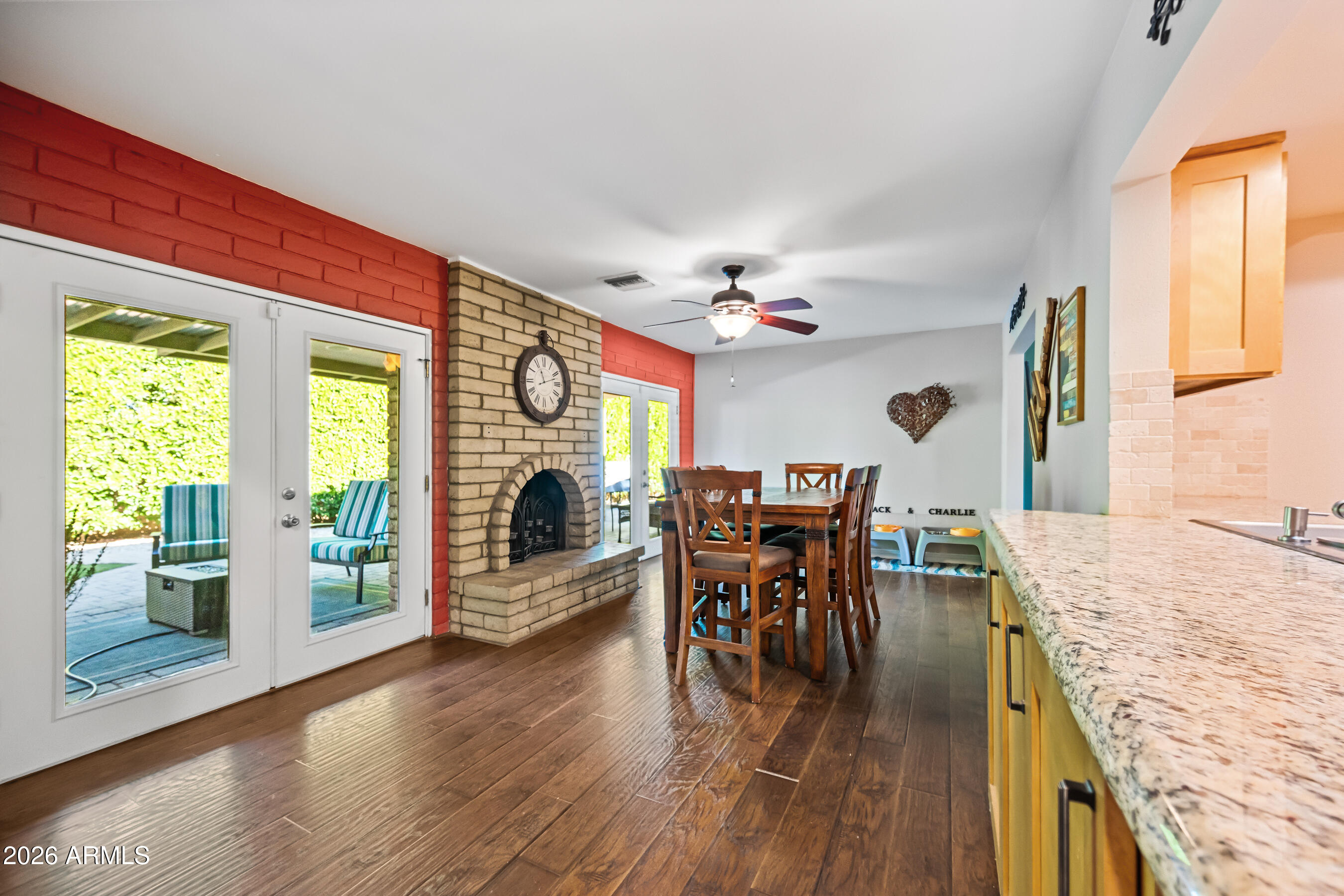 5802 South Stanley Place Tempe, AZ 85283 - Photo 18 of 50 a view of a dining room with furniture window and wooden floor