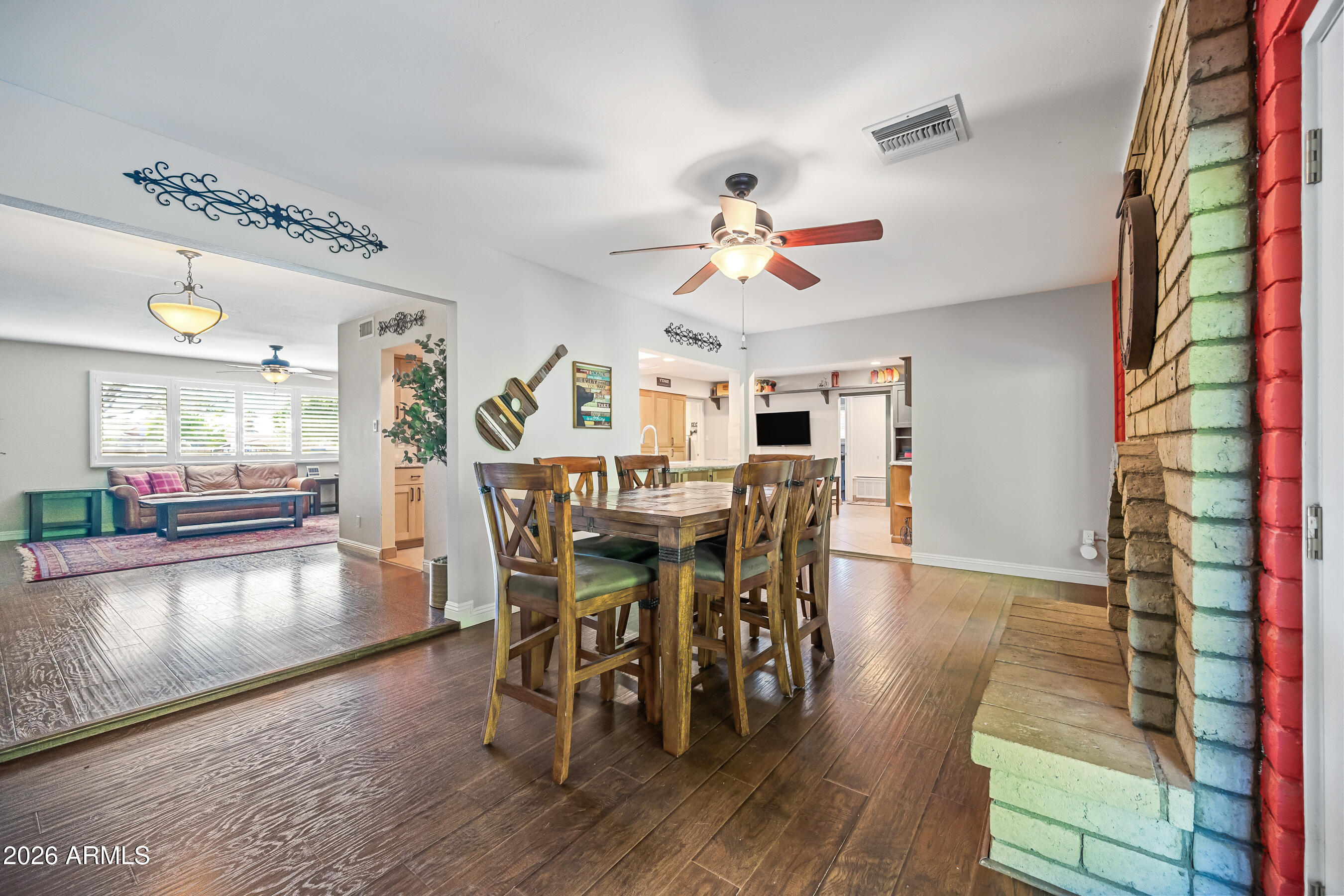 5802 South Stanley Place Tempe, AZ 85283 - Photo 19 of 50 a view of a dining room with furniture window and wooden floor
