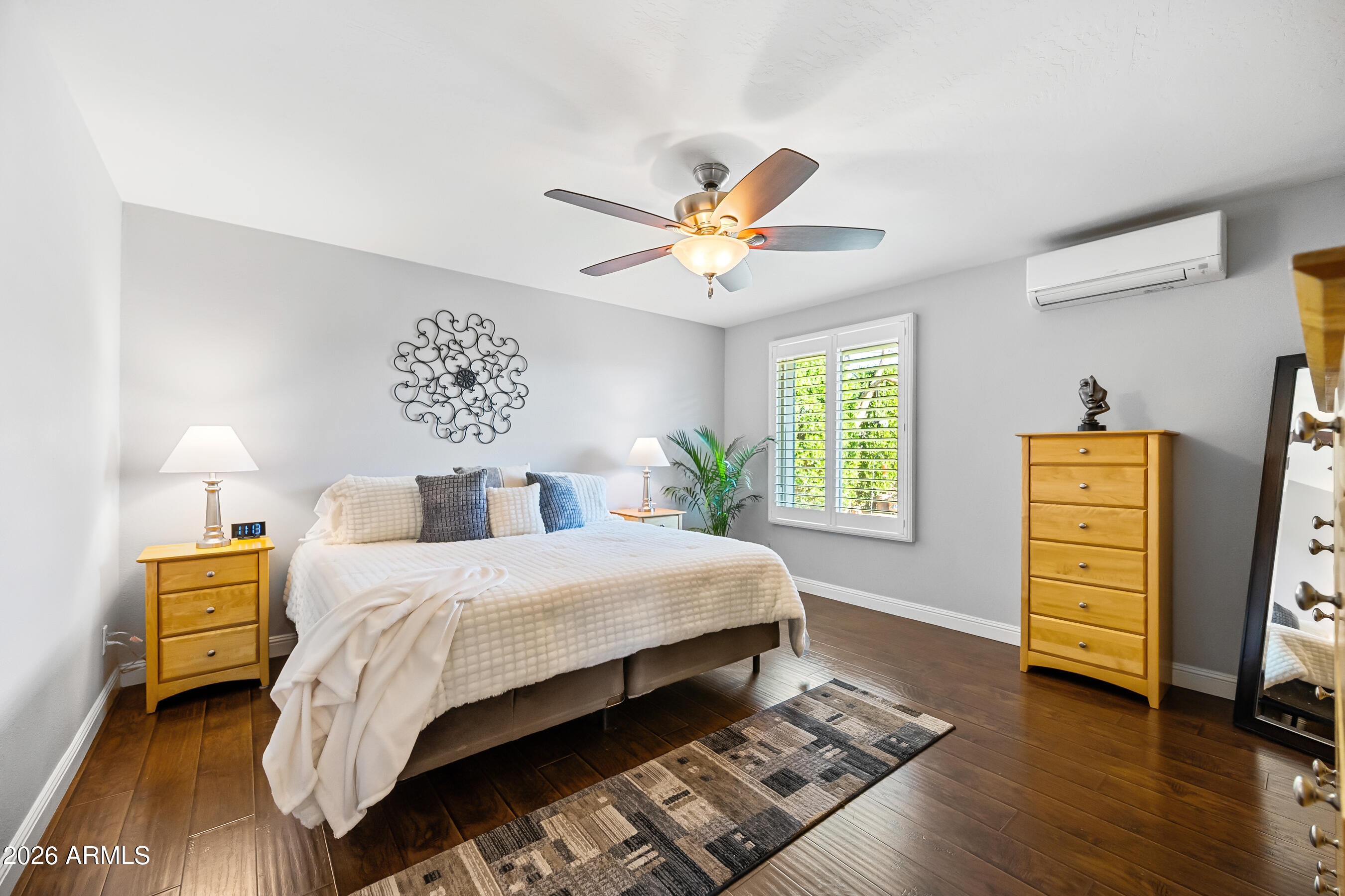 5802 South Stanley Place Tempe, AZ 85283 - Photo 21 of 50 a bedroom with a bed and a dresser