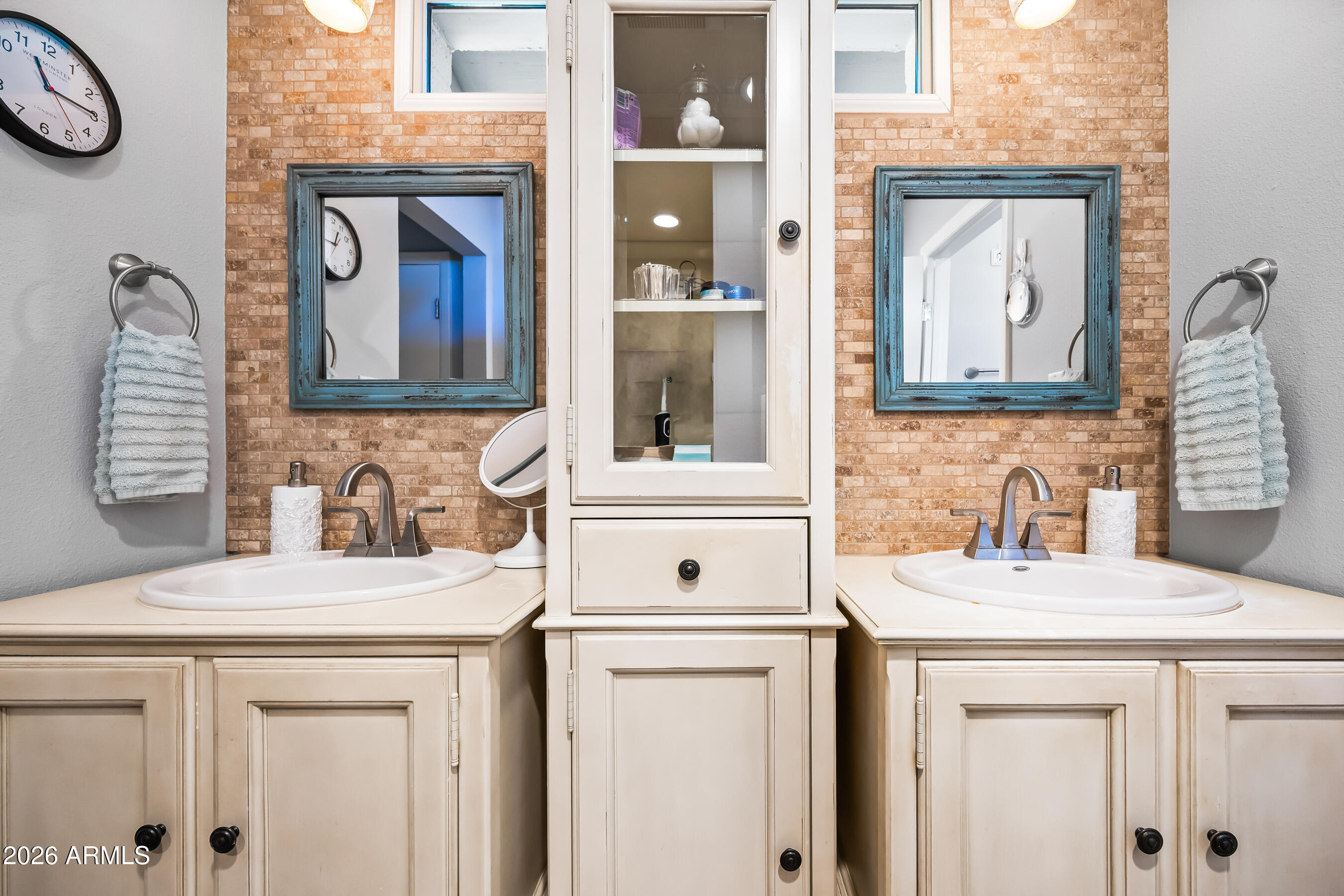 5802 South Stanley Place Tempe, AZ 85283 - Photo 24 of 50 a bathroom with a sink vanity and a mirror