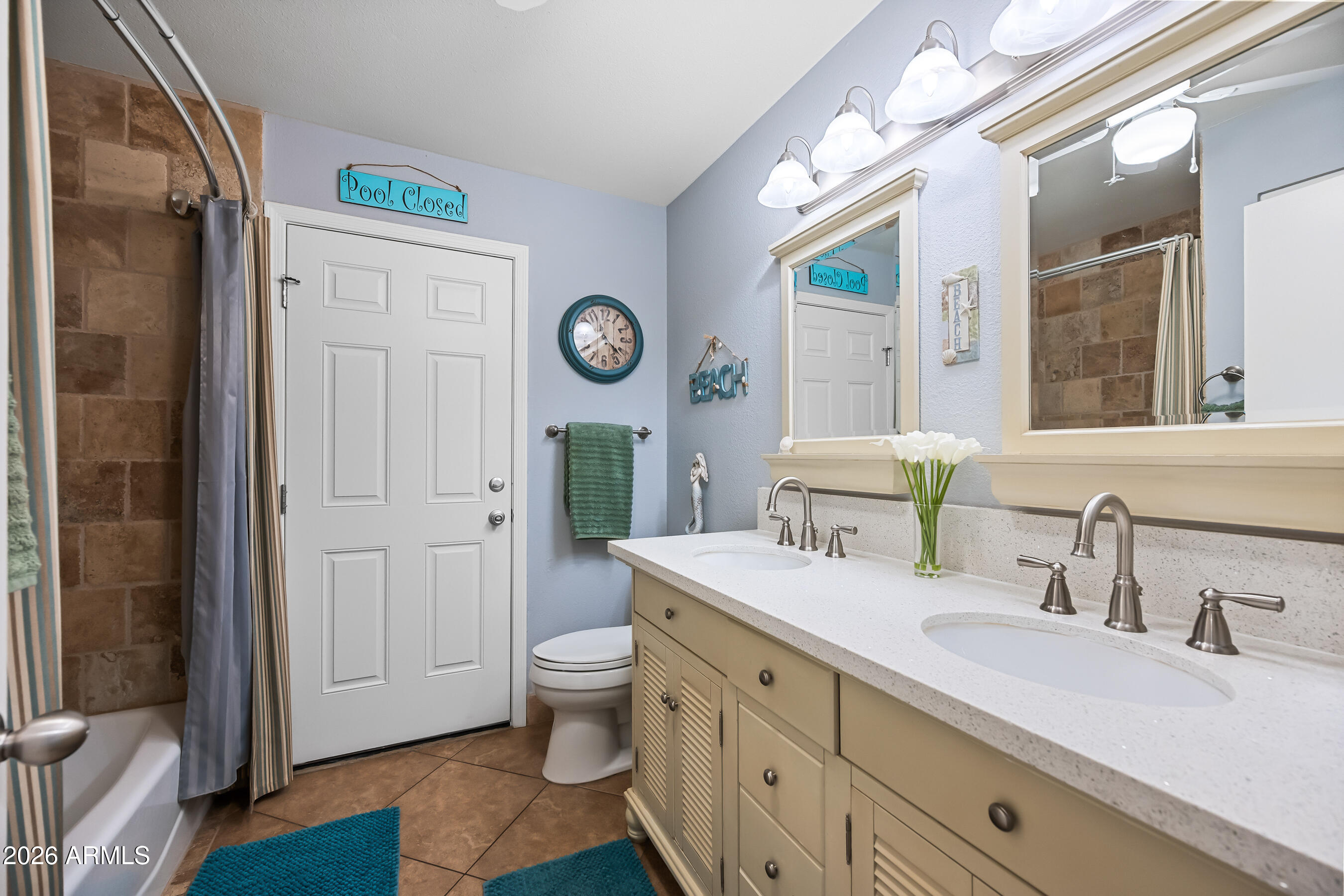 5802 South Stanley Place Tempe, AZ 85283 - Photo 33 of 50 a spacious bathroom with a granite countertop sink and a mirror