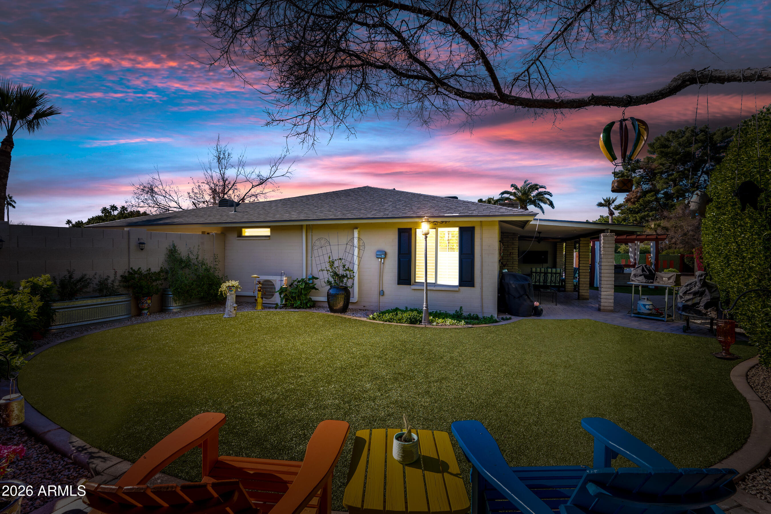 5802 South Stanley Place Tempe, AZ 85283 - Photo 41 of 50 a view of a house with backyard porch and sitting area