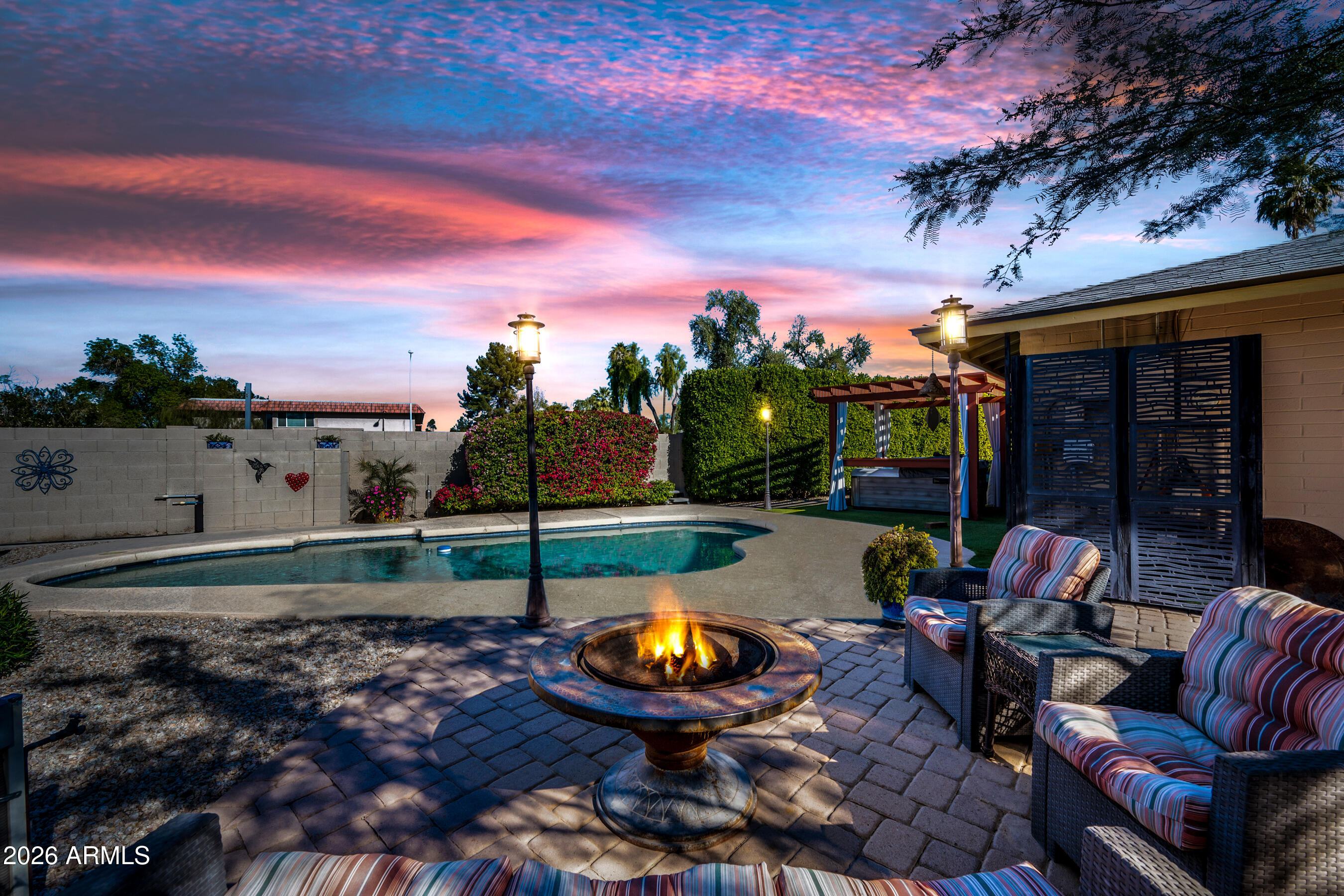 5802 South Stanley Place Tempe, AZ 85283 - Photo 5 of 50 a view of a swimming pool with a patio