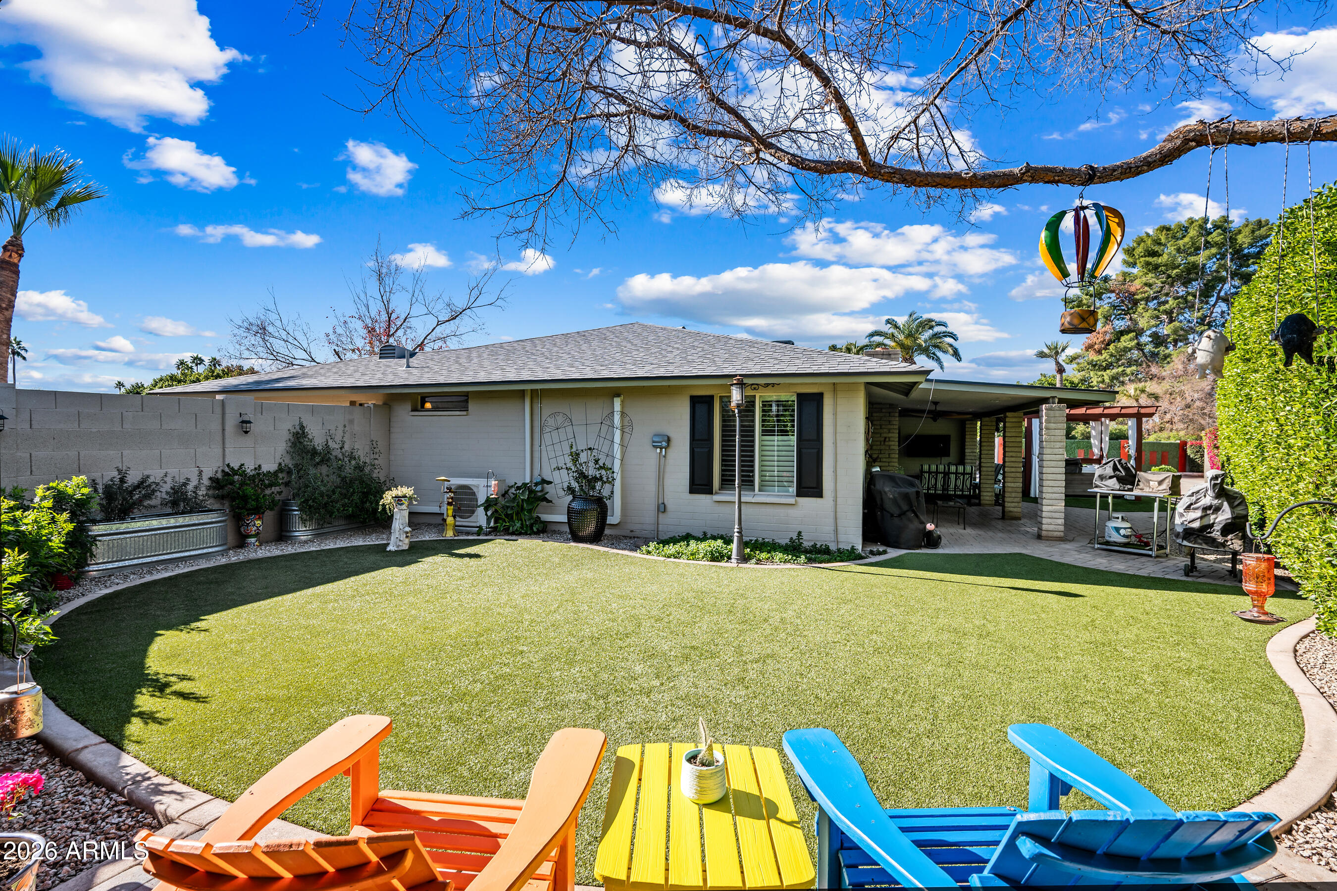 5802 South Stanley Place Tempe, AZ 85283 - Photo 8 of 50 a view of a house with swimming pool and sitting area