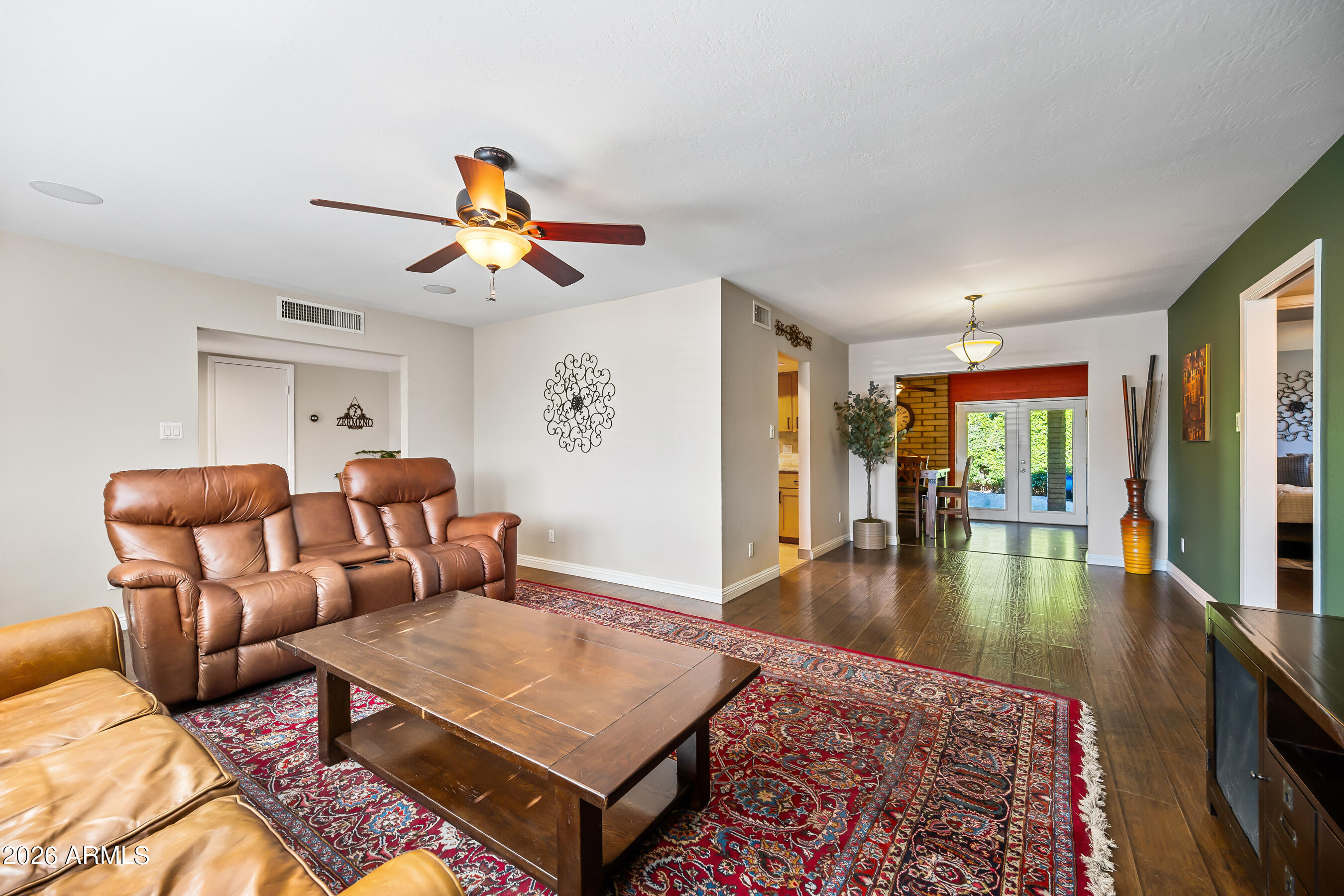 5802 South Stanley Place Tempe, AZ 85283 - Photo 10 of 50 a living room with furniture rug and a floor to ceiling window