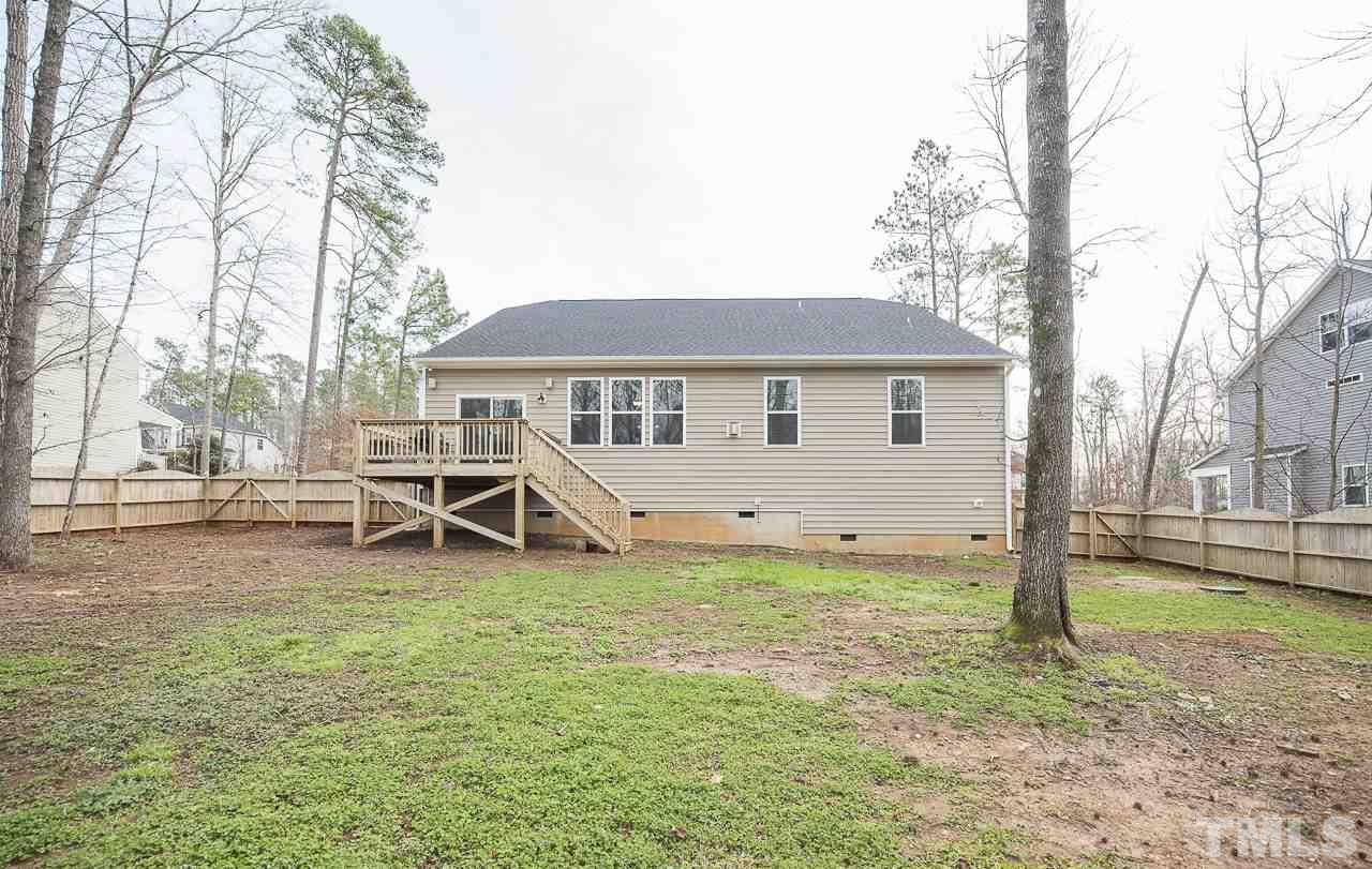 1136 Farmers Branch Road Willow Spring, NC 27592 - Photo 27 of 30 a view of a house with a yard and sitting area
