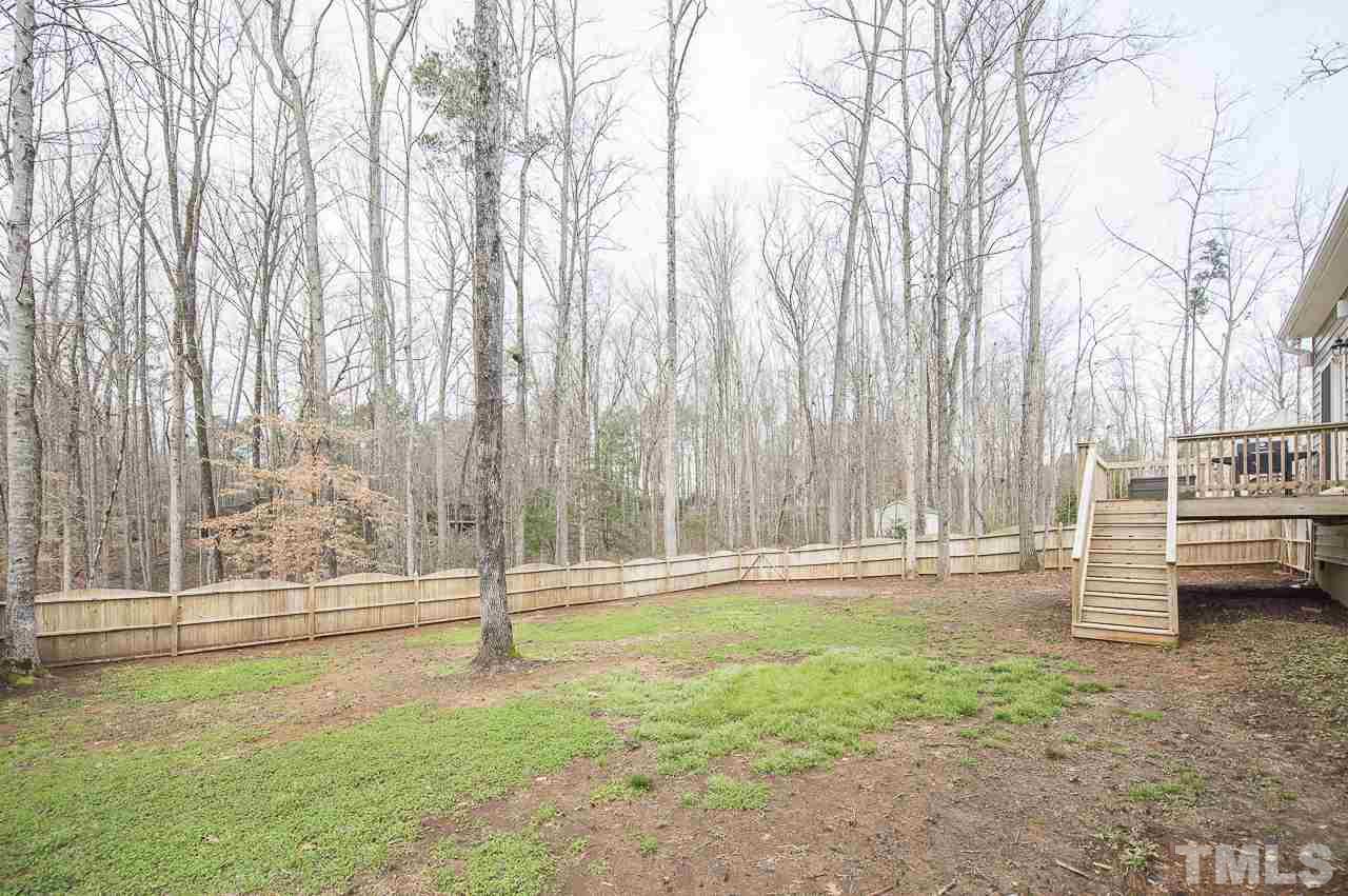 1136 Farmers Branch Road Willow Spring, NC 27592 - Photo 28 of 30 a view of a yard with entertaining space