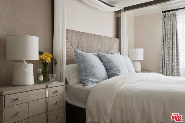 a view of a bathtub and bench