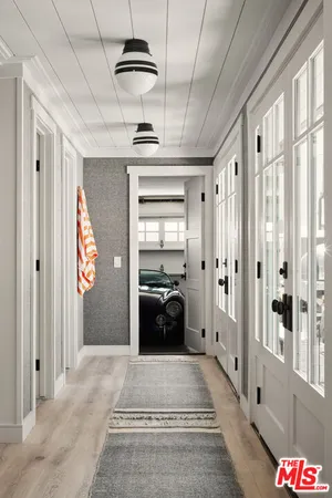 a view of a dining room with chairs and tables
