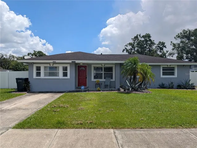 front view of a house with a patio